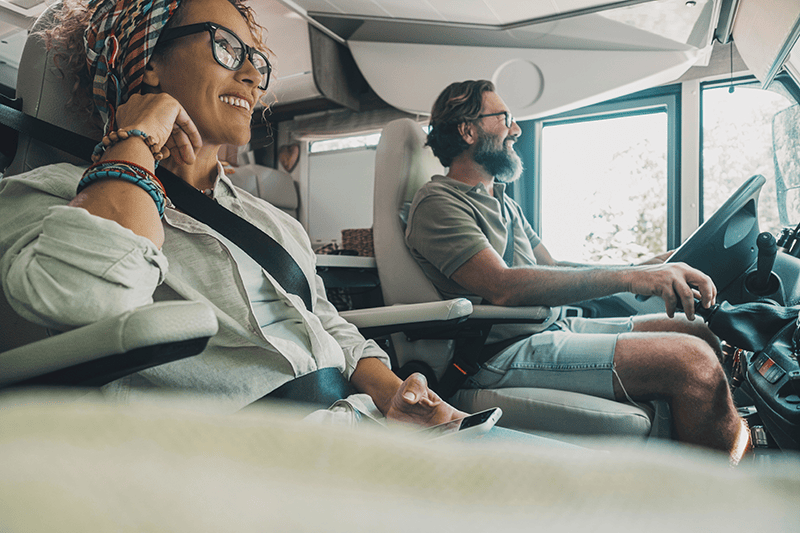 Couple_Driving_Camper