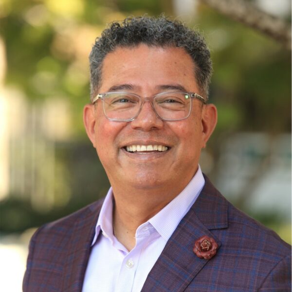 Headshot of Quezada